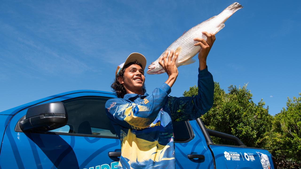 Keegan Payne, a 19-year-old Northern Territorian, caught a barramundi worth $1 million on Sunday morning in the Katherine River as part of the Million Dollar Fish angling competition. Picture: Pema Tamang Pakhrin