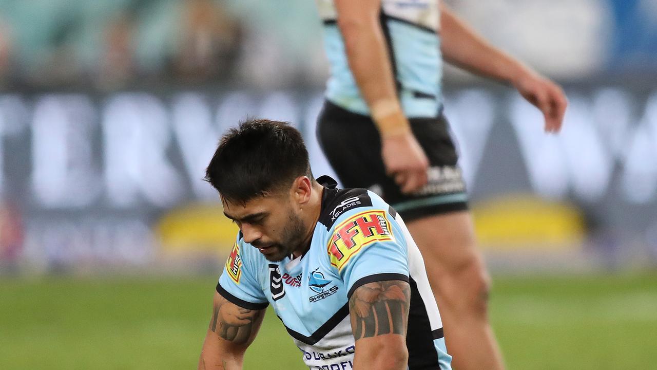 A dejected Shaun Johnson of Cronulla after kicking the ball out on the full close to full time in the Bulldogs v Cronulla NRL match at ANZ Stadium, Homebush. Picture: Brett Costello