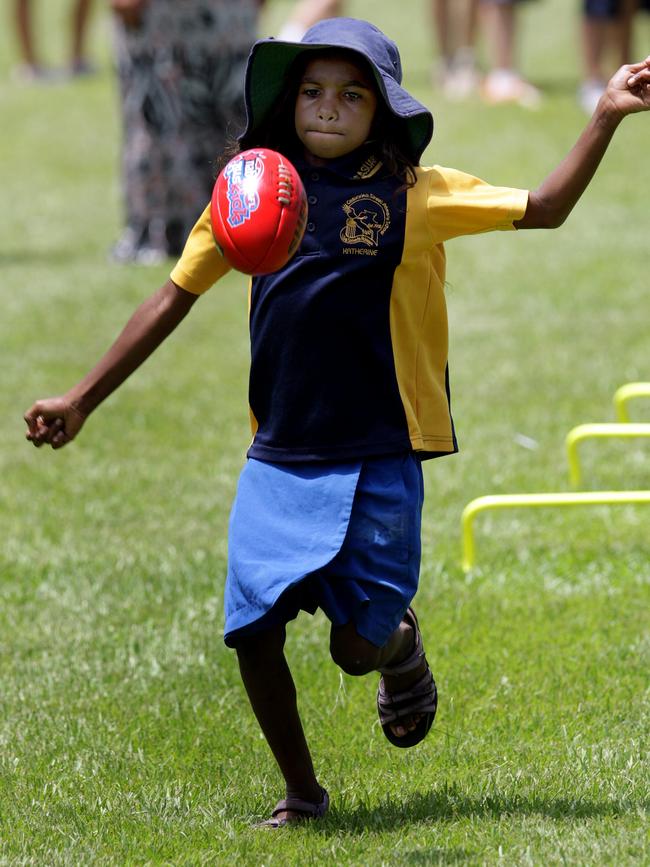 A young footballer when Hawthorn Football Club visited Katherine. Picture: