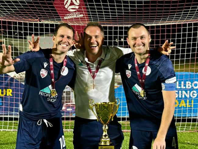 Marlin Coast coach Crios O'Hare, assistant coach Gavin Broomhead and captain Charlie Beverley after claiming the Crad Evans Trophy. Picture: Supplied