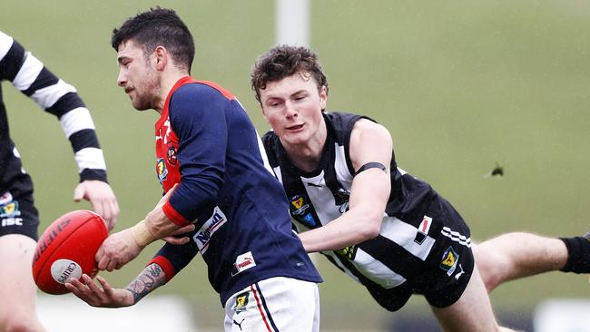 Round 6 TSL match between Glenorchy v North Hobart from KGV. North Hobart's Jeffrey Fisher is tackled by Glenorchy's Cooper Meredith. Picture: Zak Simmonds