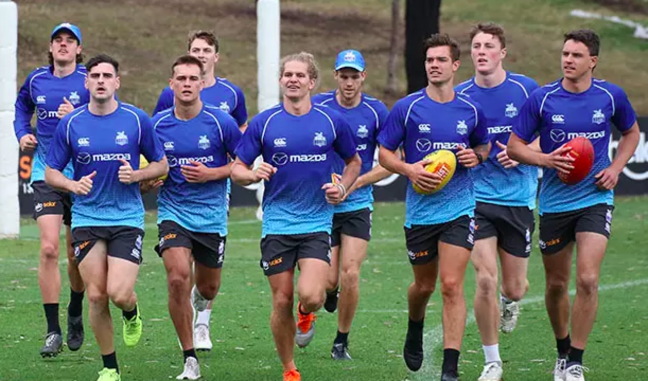 Adelaide players hit the track.