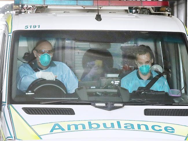 Guests in quarantine at Hotel Grand Chancellor in Brisbane being transported in ambulances to other hotels. Pics Tara Croser.