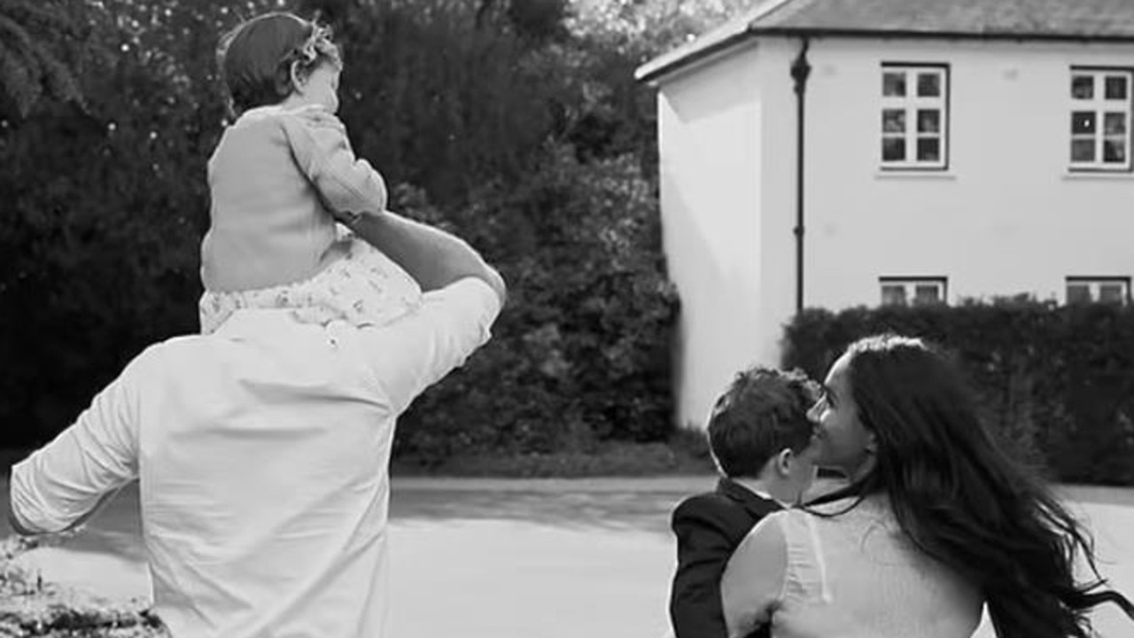 Harry and Meghan carry their children up the driveway. Picture: Netflix