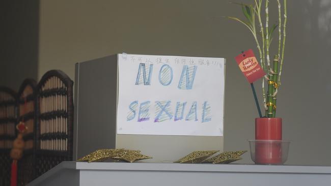 A handwritten sign, reading ‘non-sexual’, is still taped to the front counter.