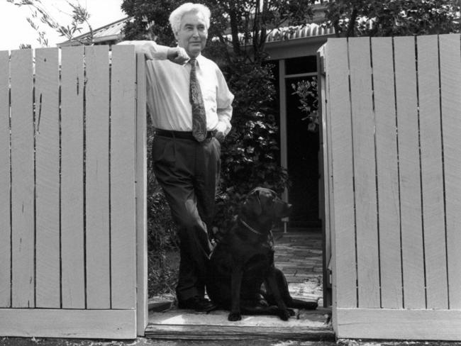 MP Bruce Goodluck with one of his many labradors.