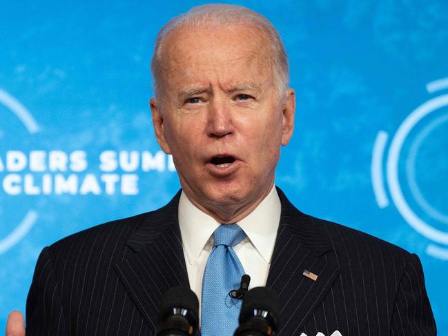 (FILES) In this file photo taken on April 23, 2021 US President Joe Biden delivers remarks and participates in the virtual Leaders Summit on Climate Session 5: The Economic Opportunities of Climate Action from the White House in Washington, DC. - President Joe Biden has hit some big targets in 100 days, starting with an epic effort to pull the United States from its Covid-19 nightmare, but headaches lie ahead. (Photo by JIM WATSON / AFP)