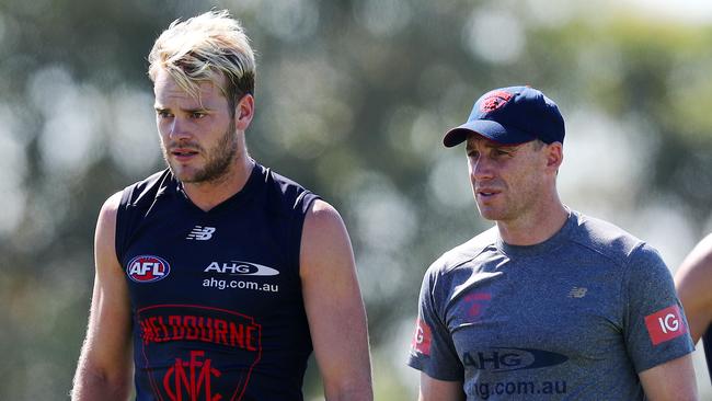 Jack Watts talks with coach Simon Goodwin at training today. Picture: Michael Klein