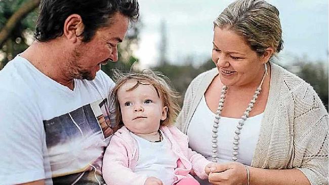 SHOCK DIAGNOSIS: Joel and Catherine Topliff with their daughter Ellie, who has a very rare illness called Tay-Sachs disease that has no cure. The family needs to raise $10,000 for an airway clearance device. Picture: Anya Maria Photography