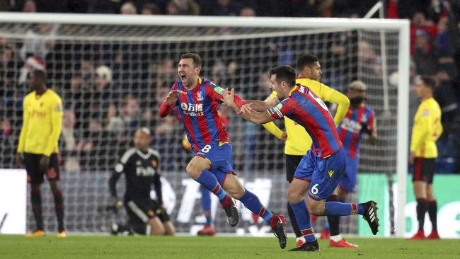 Crystal Palace's James McArthur (C) celebrates scoring his side's second goal.