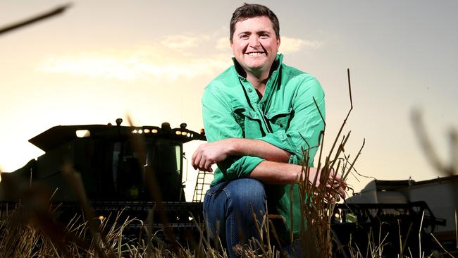 Wade Dabinett in a wheat field at the family farm in Parilla. Picture: Simon Cross