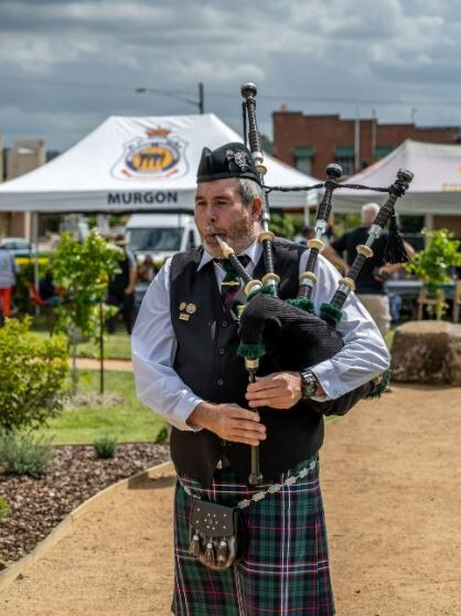 'Bagpipes Mark' playing at the opening of the Veterans’ Memorial Park. Photo: Gerkies Photography