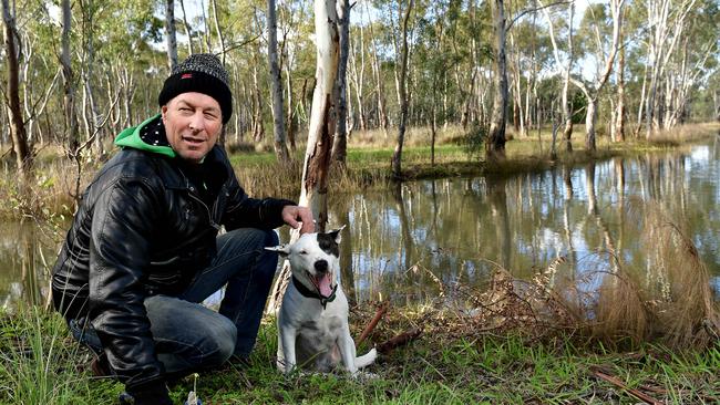 VISITORS: Chris Jones takes his dog Jay to the Kaurna wetlands regularly. Picture: <span id="U6122848526768jE" style="text-transform:uppercase;">Keryn Stevens</span>