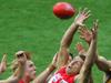 10/10/2005 NEWS: AFL 2005 Grand Final - Sydney Swans V West Coast Eagles. - Swan Leo Barry takes the match winning mark in a congested pack. The ball was held in by Barry who was pounced upon by teamates when the siren went.