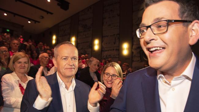 Federal Opposition Leader Bill Shorten applauds Mr Andrews. AAP Image/Ellen Smith