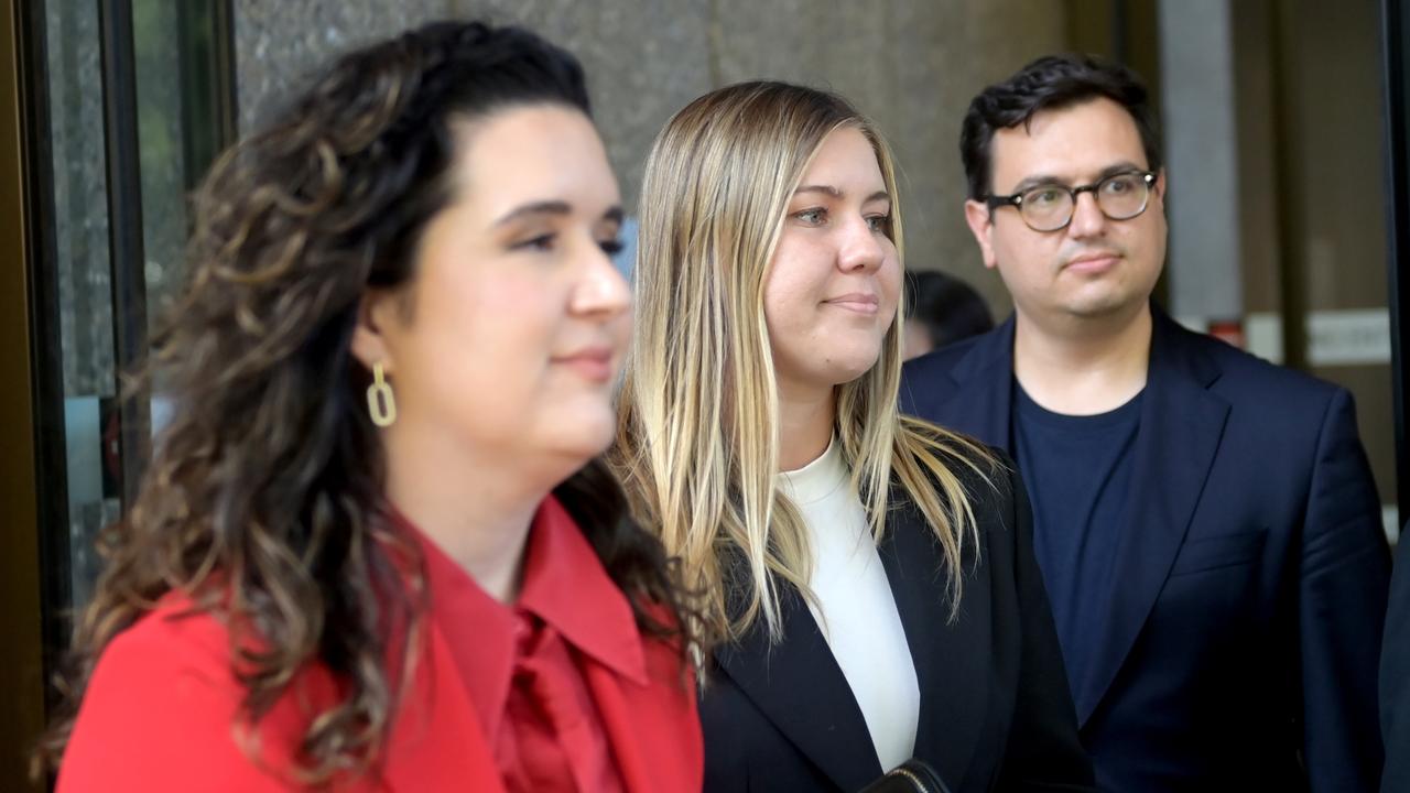 Brittany Higgins (centre) entering court with David Sharaz (right). Picture: NCA NewsWire/Jeremy Piper.