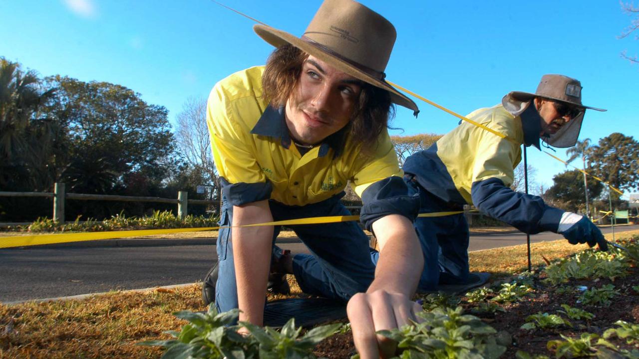 Toowoomba City Council Gardener Sam McBeth along with Trevor Jordan are planting at Laurel Bank Park in preparation for the Annual Carnival of Flowers due to kick off in seven weeks.