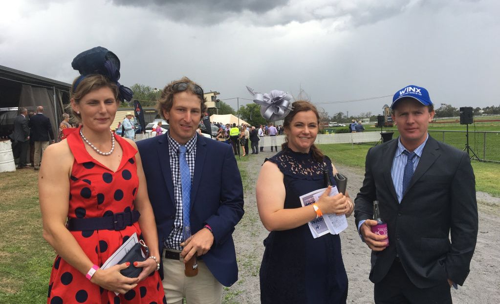 SOCIAL DAY: Katie and Russell Owens and Stephanie and Zach Cochrane catching up at the Warwick Credit Union Warwick Cup two months ago. A large crowd is expected at the Boxing Day Races today. Picture: Sophie Lester