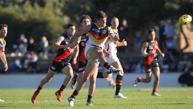 Adelaide's Patrick Wilson heads for goal. (Picture: AAP Image/Dean Martin)