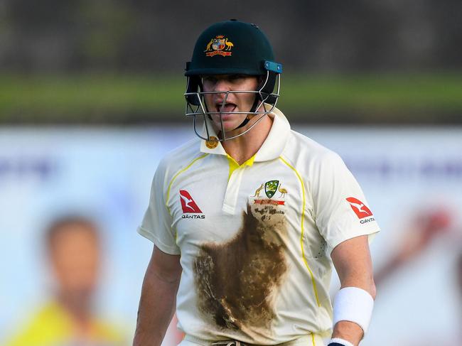 Australia's Steven Smith walks back to the pavilion after his dismissal during the first day of the first cricket Test match between Sri Lanka and Australia at the Galle International Cricket Stadium in Galle on June 29, 2022. (Photo by ISHARA S. KODIKARA / AFP)