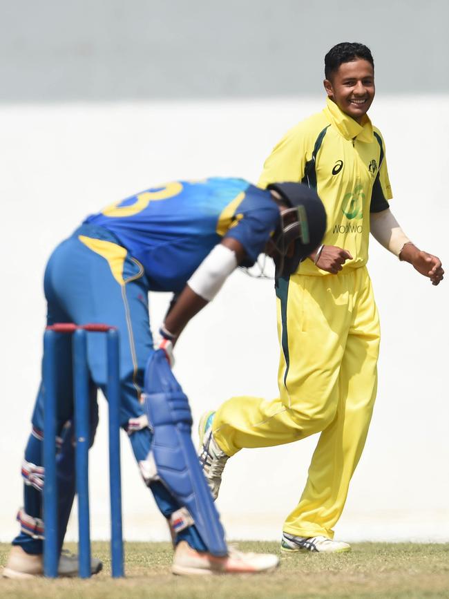 Australia Under 19 cricketer Tanveer Sangha in action for Australia in Sri Lanka.