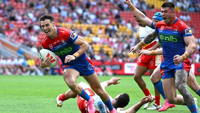 BRISBANE, AUSTRALIA - APRIL 28: David Armstrong of the Knights scores a try during the round eight NRL match between Dolphins and Newcastle Knights at Suncorp Stadium, on April 28, 2024, in Brisbane, Australia. (Photo by Bradley Kanaris/Getty Images)