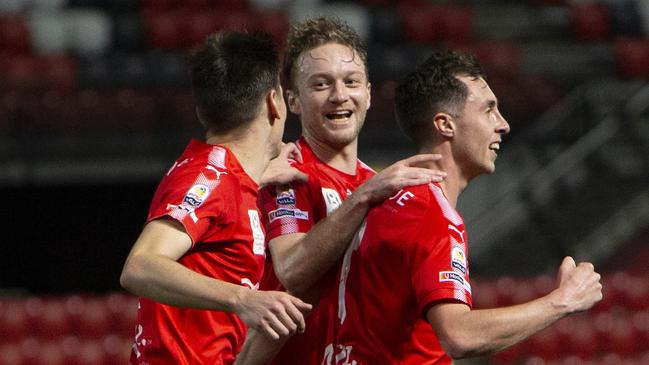 Marc Marino celebrates one of his three goals. Picture: AAP/Emma Brasier