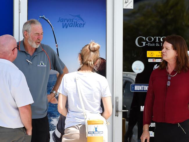 People outside the store after the armed robbery. Picture: Josie Hayden