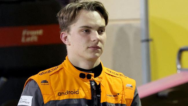 McLaren's Australian driver Oscar Piastri walks in the pits during the qualifying round of the Bahrain Formula One Grand Prix at the Bahrain International Circuit in Sakhir on March 4, 2023. (Photo by Giuseppe CACACE / POOL / AFP)