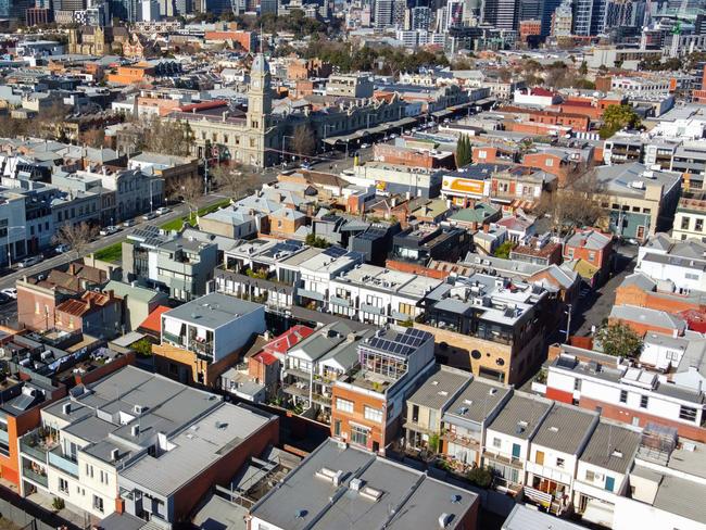 Aerial view of houses and apartments in popular inner city suburb of North Melbourne.