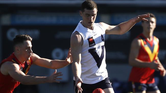 Sam Flanders evades a would-be tackler during the Under-18 carnival.