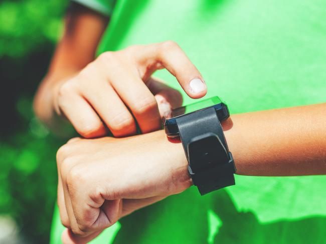 Parents are getting around the school phone ban by buying their kids smartwatches. Picture: istock