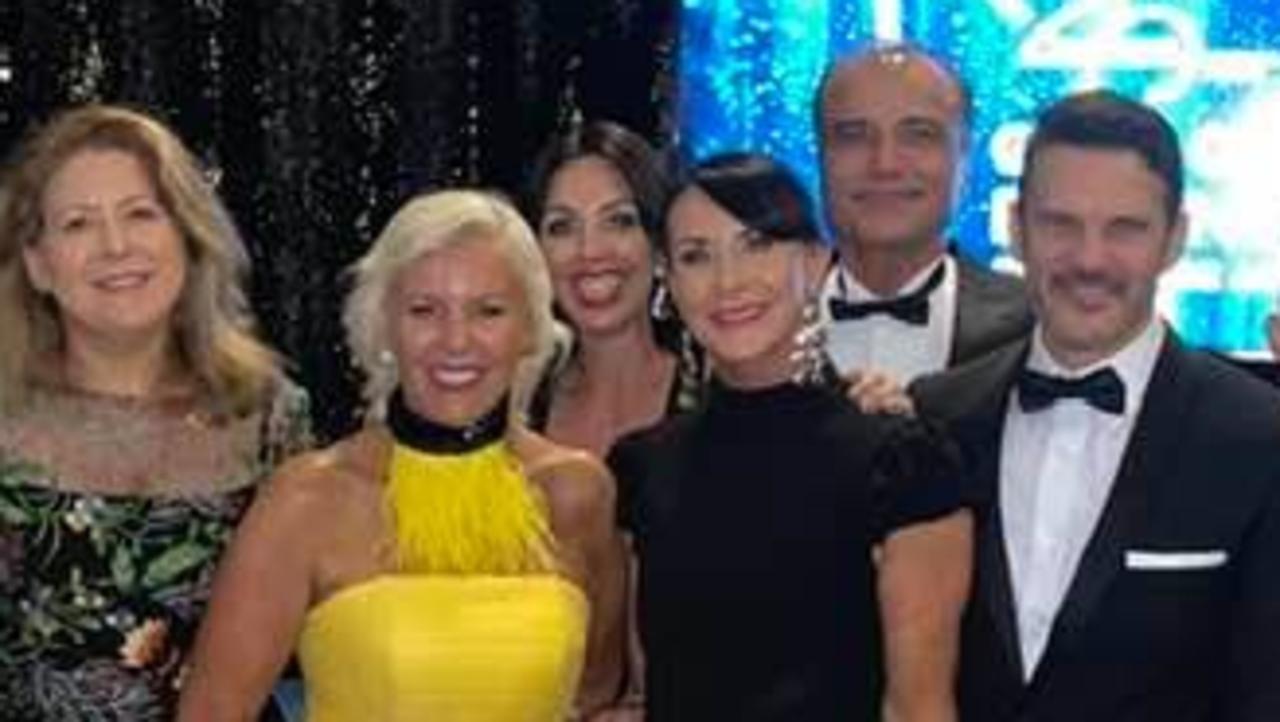 Felicity Cohen, centre in black, with Dr Reza Adib behind her, at the Gold Coast Business Excellence Awards.