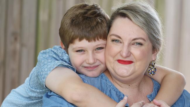 Brisbane mother Abby Stiefel  with her 9-year-old son Felix  at their home. Dog is called Ernest Pizza .Pic Annette Dew