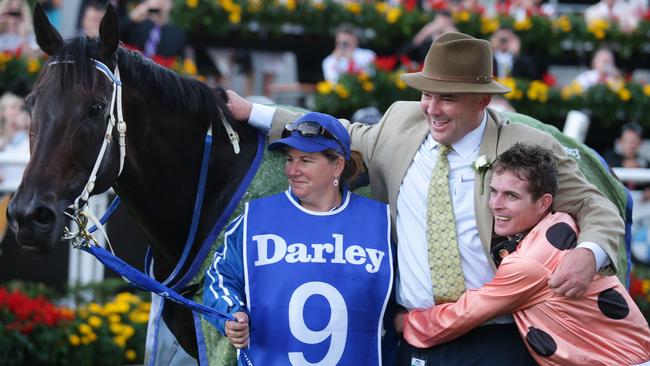 One of Luke Nolen’s special Black Caviar moments, sharing her 2013 TJ Smith win in Sydney with trainer Peter Moody and strapper Donna Fisher. Picture: Cameron Richardson