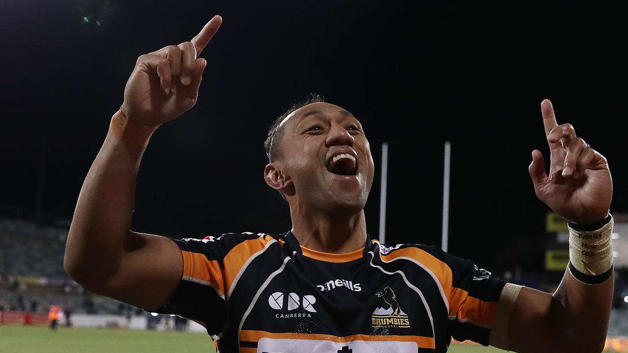 Christian Leali'ifano of the Brumbies celebrates towards his family following victory.