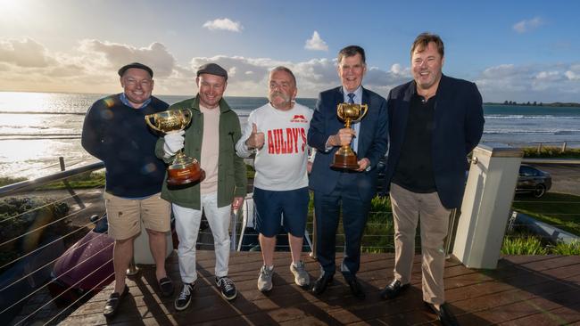 Port Fairy, VIC: Sam and Matt Hyland, Tim Auld, Des Gleeson and Nick Williams celebrate the Cup’s enduring legacy with the 2023 edition and the cherished 1985 Cup won by What a Nuisance. Picture: Jay Town