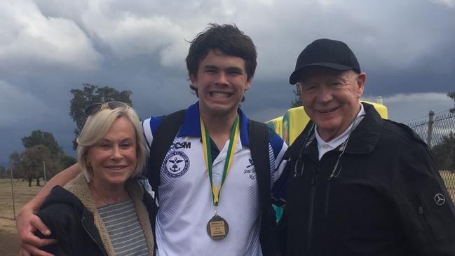 Zac Fulton with his grandparents Anne and Bob Fulton.