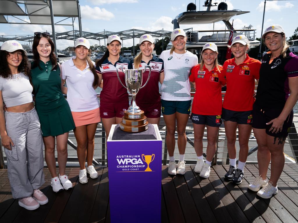 Queensland's top female athletes with the Karrie Webb Cup after it was announced that the Australian WPGA Championship would be played at Sanctuary Cove on the Gold Coast. Picture: Dan Peled.