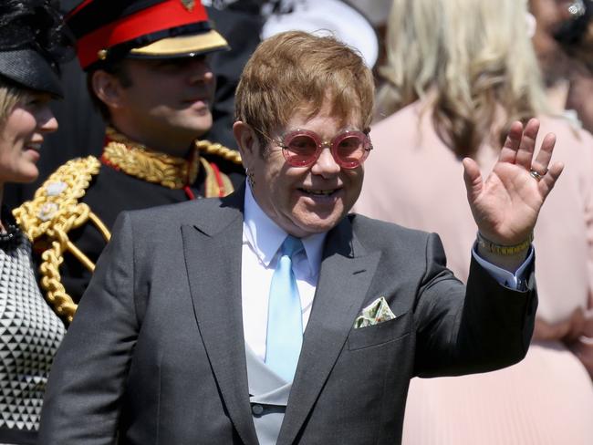 Music legend Elton John waves after the  ceremony. Picture: AFP