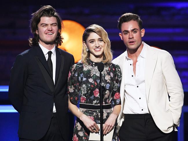 Joe Keery, Natalia Dyer and Dacre Montgomery speak onstage during The 23rd Annual Critics’ Choice Awards at Barker Hangar on January 11, 2018 in Santa Monica, California. Picture: Getty