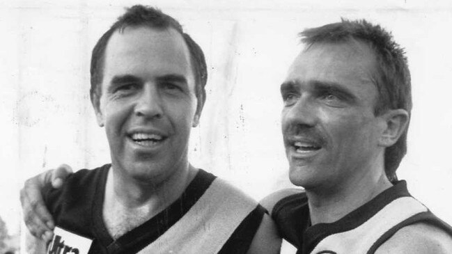 John Schneebichler (right) with Glenelg great Peter Carey in 1989.