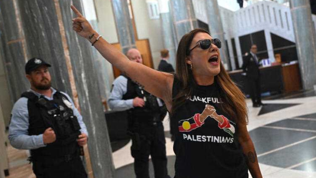 Independent Senator Lidia Thorpe protests inside the Marble Foyer at Parliament House in Canberra. Picture: AAP