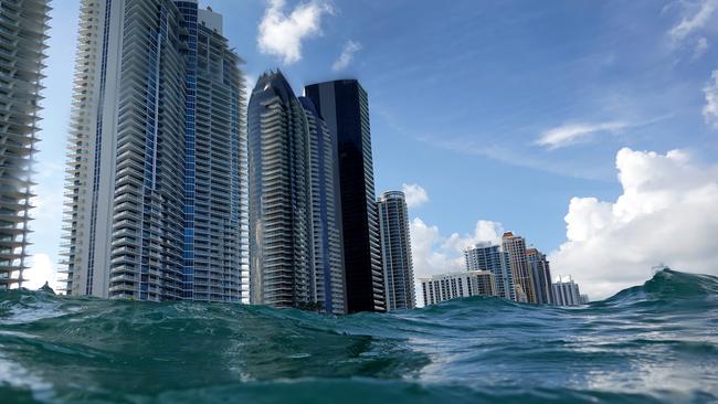 Waves lap ashore near condo buildings in Sunny Isles, Florida. Picture: Getty Images