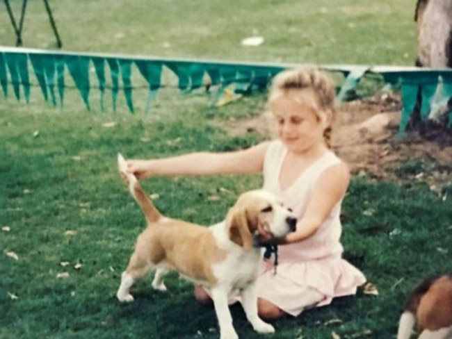 Rebel Wilson as a child with her pet beagle. Picture: Instagram/Rebel Wilson