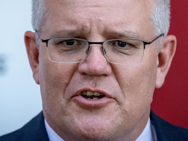 MELBOURNE, AUSTRALIA - NOVEMBER 16: Prime Minister Scott Morrison speaks during a press conference at CSL Lab where a COVID-19 Vaccine is being produced on November 16, 2020 in Melbourne, Australia. The federal government has announced a $1.8 billion agreement with pharmaceutical company CSL to construct a new biotech and vaccine manufacturing plant in Melbourne. The plant - to be the largest in the southern hemisphere - will deliver the first population-wide pandemic and seasonal flu vaccines for Australians, safeguarding the nation from global supply chain shortages or queues. (Photo by Darrian Traynor/Getty Images)