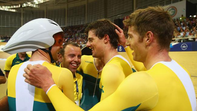 Jack Bobridge, Luke Davison, Alex Edmondson and Glenn O'Shea of Australia celebrate with coaching staff.