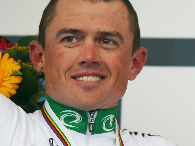 PONFERRADA, SPAIN - SEPTEMBER 28: (l to r) Simon Gerrans (2nd) of Australia, Michal Kwiatkowski (1st) of Poland and Alejandro Valverde (3rd) of Spain stand on the podium after the Elite Men's Road Race on day seven of the UCI Road World Championships on September 28, 2014 in Ponferrada, Spain. (Photo by Bryn Lennon/Getty Images)