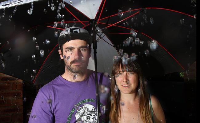 Mitch Beggs and Clare Fitzpatrick from Fingal dont like the idea of a wet summer season Photo Blainey Woodham / Daily News. Picture: Blainey Woodham