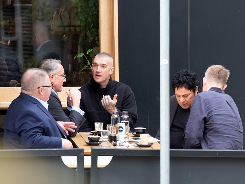 Foxtel boss Patrick Delany, Fox Sports managing director Steve Crawley, Dustin Martin, Fox Footy commentator Jack Riewoldt and Martin's manager Ralph Carr.